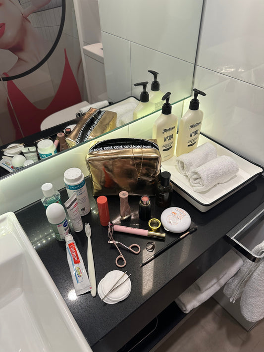 Best travel makeup bag with insulated lining and waterproof zipper to help prevent makeup leaks in handbags or suitcases